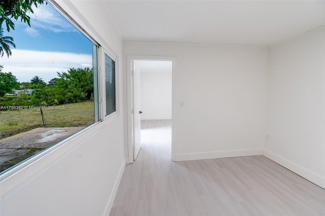 3531 NW 26th St, Lauderdale Lakes, FL 33311 - hall featuring light wood-style floors and baseboards