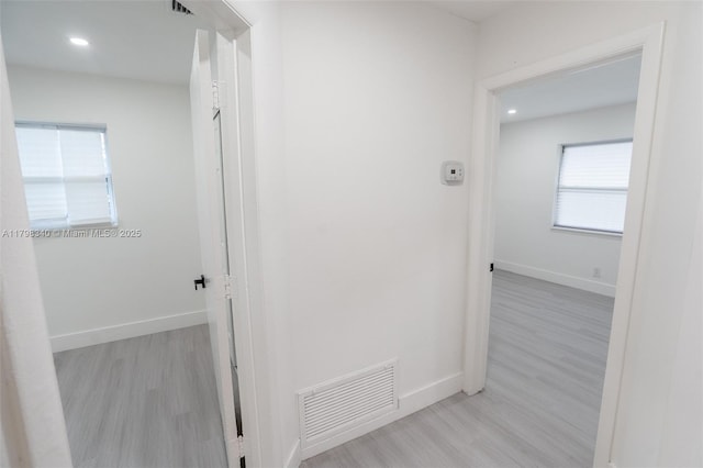 3531 NW 26th St, Lauderdale Lakes, FL 33311 - corridor with wood finished floors, recessed lighting, and baseboards