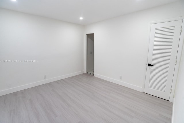 3531 NW 26th St, Lauderdale Lakes, FL 33311 - spare room with recessed lighting, light wood-type flooring, and baseboards