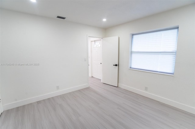 3531 NW 26th St, Lauderdale Lakes, FL 33311 - spare room featuring baseboards, light wood-style flooring, and recessed lighting