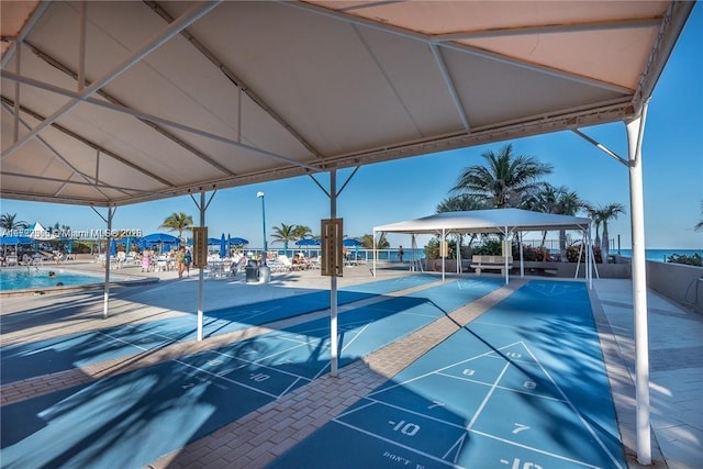 view of home's community with shuffleboard