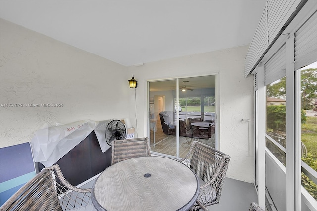 14030 Nesting Way Unit D, Delray Beach, FL 33484 - sunroom with healthy amount of natural light and outdoor dining area