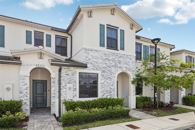 28625 SW 132nd Ct, Homestead, FL 33033 - view of front of property with stucco siding and stone siding