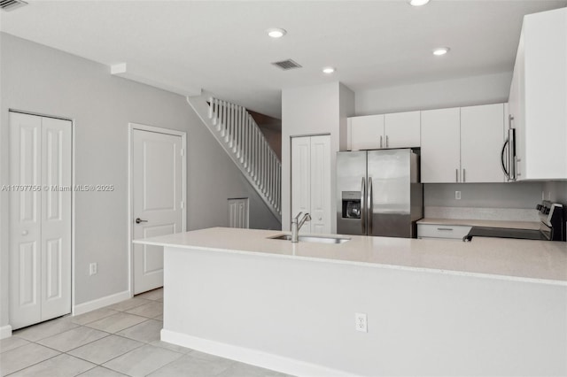 28625 SW 132nd Ct, Homestead, FL 33033 - kitchen with stainless steel appliances, a sink, light countertops, recessed lighting, and light tile patterned flooring