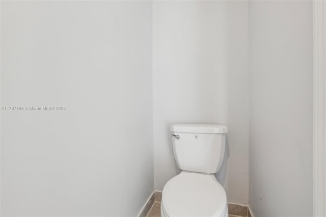 28625 SW 132nd Ct, Homestead, FL 33033 - bathroom featuring baseboards and toilet