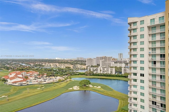 water view with a golf club and nearby urban area