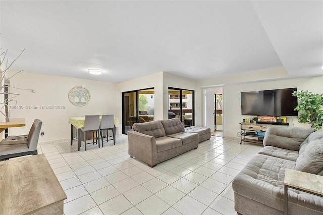 living area featuring light tile patterned flooring