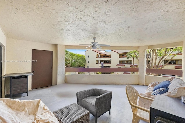 view of patio / terrace featuring outdoor lounge area, ceiling fan, and a balcony