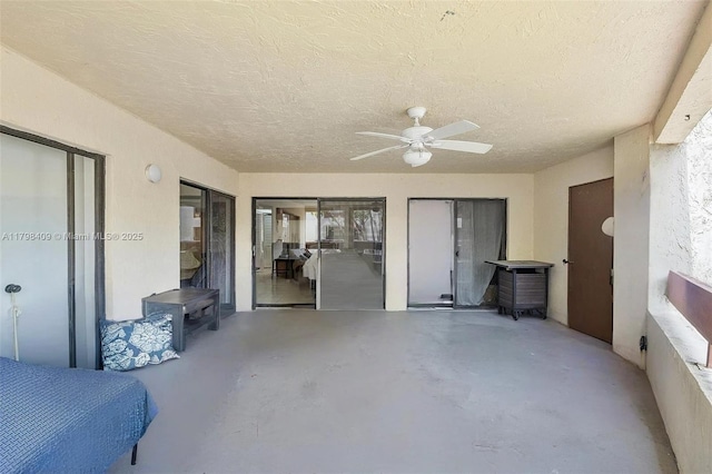 view of patio featuring a ceiling fan