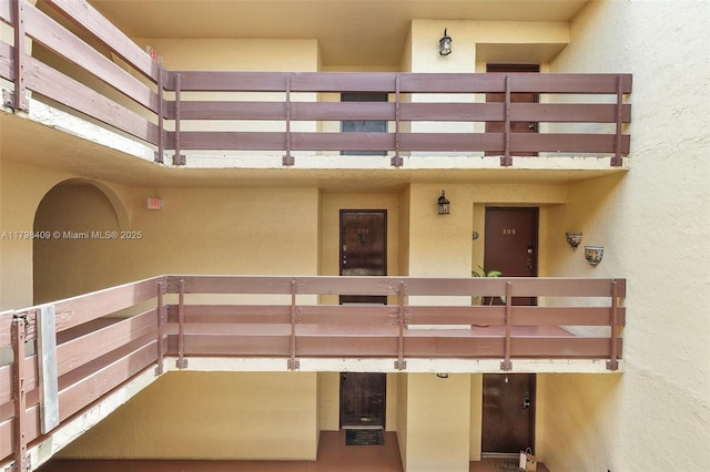 doorway to property featuring a balcony