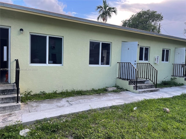8321 NE Miami Ct, Miami, FL 33138 - view of front of property featuring stucco siding and a front yard
