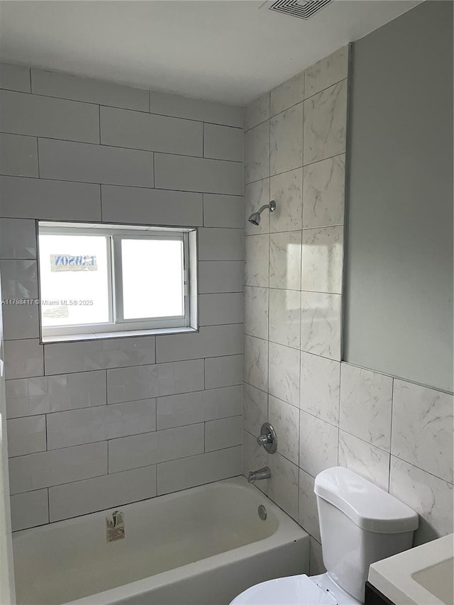 8321 NE Miami Ct, Miami, FL 33138 - full bath featuring shower / washtub combination, toilet, tile walls, and vanity