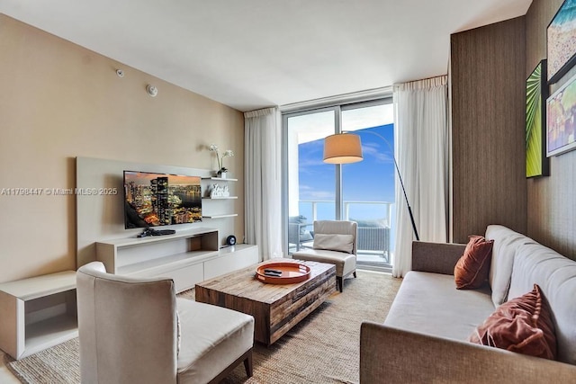 living room with a wall of windows
