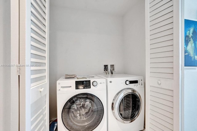 laundry area with washer and clothes dryer