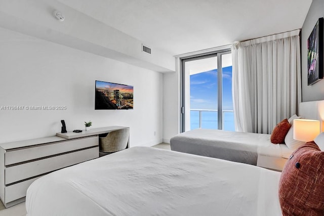 bedroom with access to outside