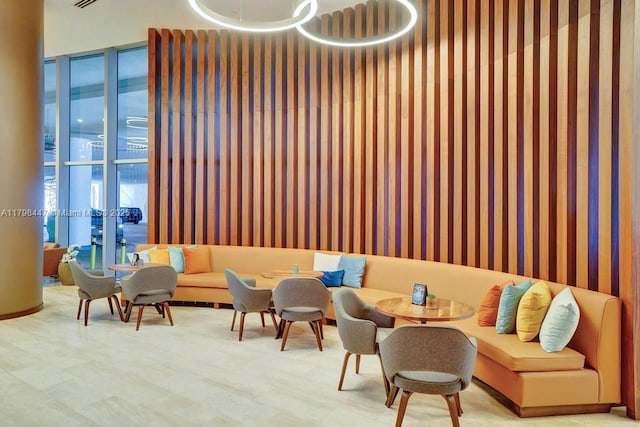 lobby featuring wallpapered walls