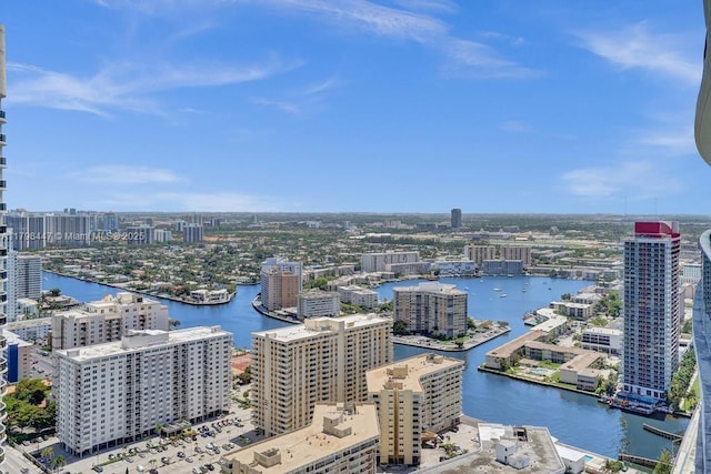 view of urban area featuring a nearby body of water