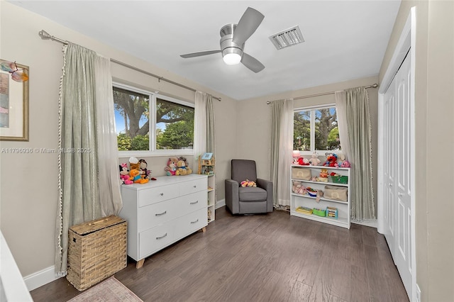 2221 N 46th Ave, Hollywood, FL 33021 - recreation room with plenty of natural light, dark wood finished floors, and a ceiling fan
