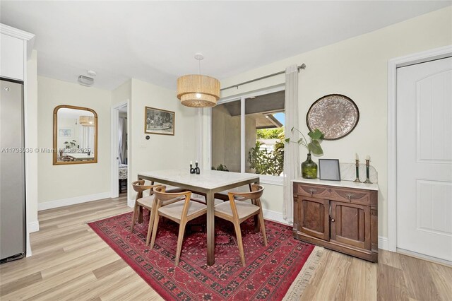 2221 N 46th Ave, Hollywood, FL 33021 - dining space featuring light wood finished floors and baseboards