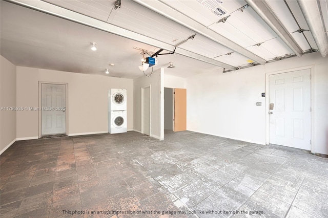2221 N 46th Ave, Hollywood, FL 33021 - garage with estacked washer and dryer, a garage door opener, and baseboards