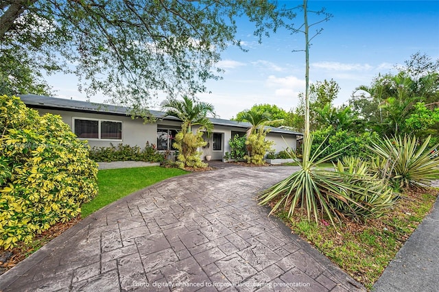 2221 N 46th Ave, Hollywood, FL 33021 - ranch-style house featuring stucco siding and driveway