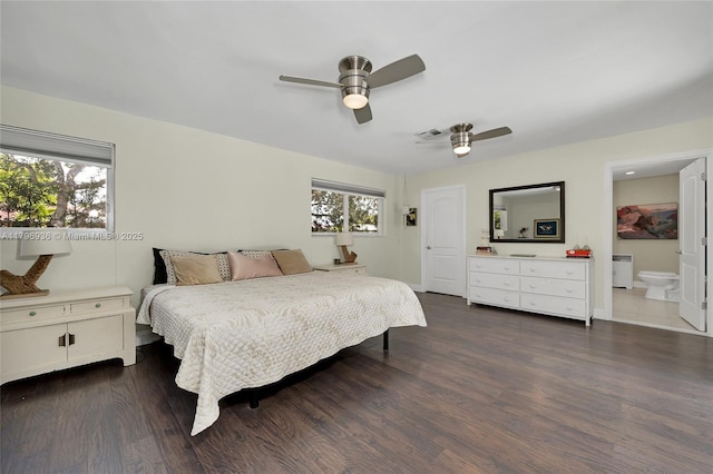 2221 N 46th Ave, Hollywood, FL 33021 - bedroom featuring dark wood-type flooring, baseboards, ceiling fan, and ensuite bath