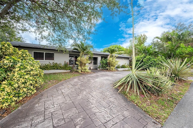 2221 N 46th Ave, Hollywood, FL 33021 - ranch-style house with stucco siding and driveway