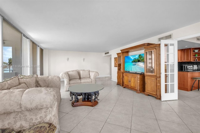 11 Island Ave Unit 512, Miami Beach, FL 33139 - living room featuring light tile patterned floors