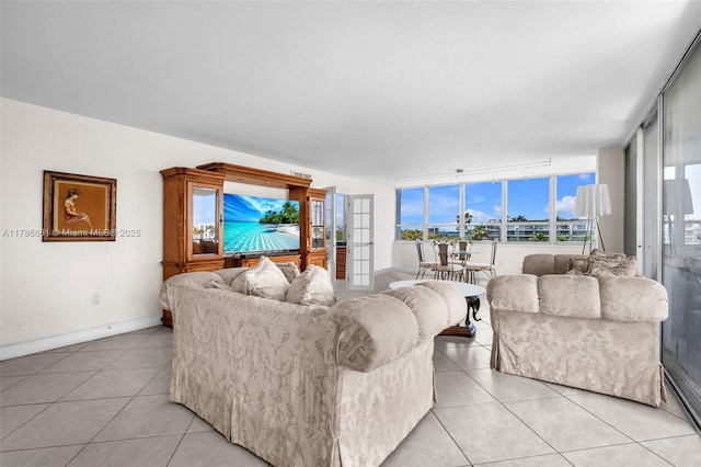 11 Island Ave Unit 512, Miami Beach, FL 33139 - living area with light tile patterned floors and baseboards