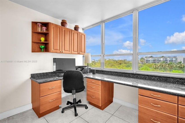 11 Island Ave Unit 512, Miami Beach, FL 33139 - home office featuring built in study area and light tile patterned floors