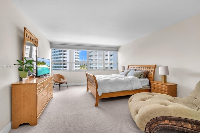 11 Island Ave Unit 512, Miami Beach, FL 33139 - bedroom featuring light carpet and baseboards