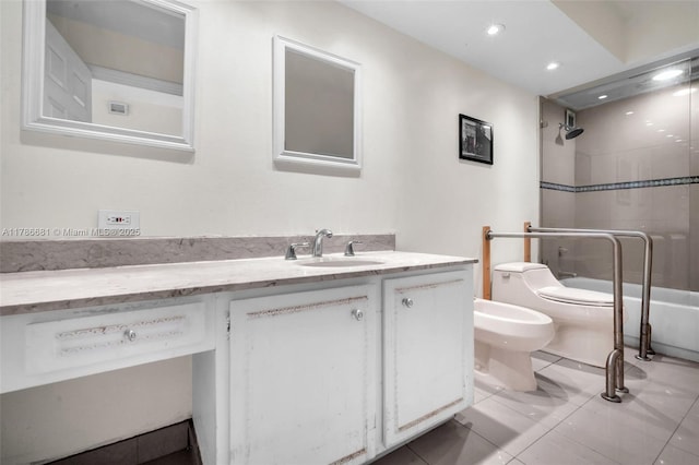 11 Island Ave Unit 512, Miami Beach, FL 33139 - bathroom with vanity, a tile shower, a bidet, toilet, and recessed lighting