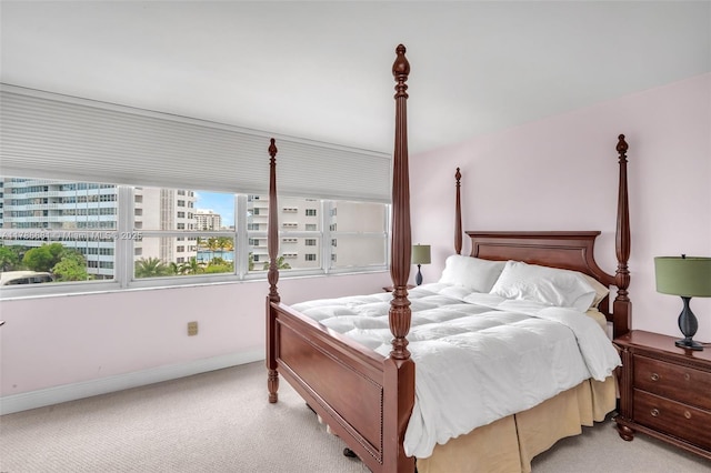 11 Island Ave Unit 512, Miami Beach, FL 33139 - bedroom with light carpet and a view of city