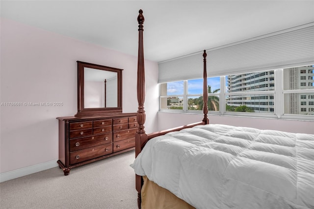 11 Island Ave Unit 512, Miami Beach, FL 33139 - bedroom featuring light carpet and baseboards
