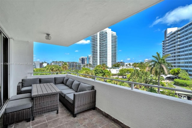 11 Island Ave Unit 512, Miami Beach, FL 33139 - balcony with a city view and outdoor lounge area