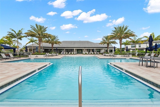 community pool featuring a patio area