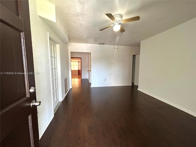 6211 NW 37th Ter, Virginia Gardens, FL 33166 - spare room featuring dark wood-style floors, ceiling fan, and baseboards