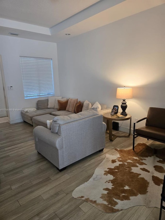 17545 SW 150th Ct, Miami, FL 33187 - living room with wood finished floors, baseboards, and a raised ceiling