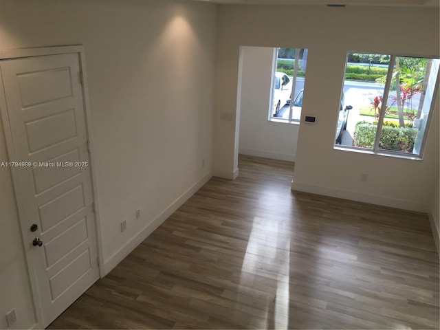 17545 SW 150th Ct, Miami, FL 33187 - spare room featuring wood finished floors and baseboards