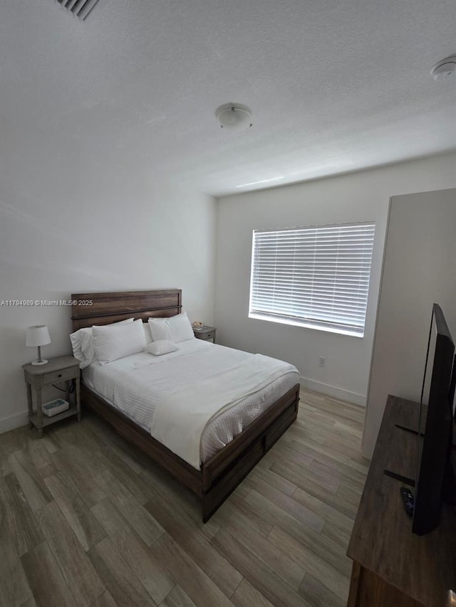 17545 SW 150th Ct, Miami, FL 33187 - bedroom featuring wood finished floors and baseboards