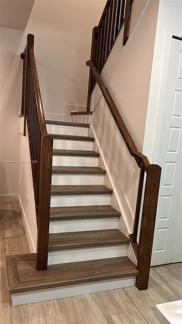 17545 SW 150th Ct, Miami, FL 33187 - staircase featuring wood finished floors