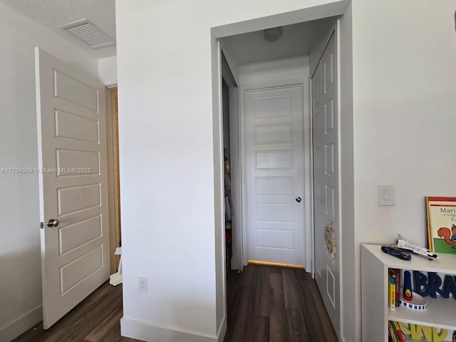 17545 SW 150th Ct, Miami, FL 33187 - corridor with dark wood-style flooring and baseboards