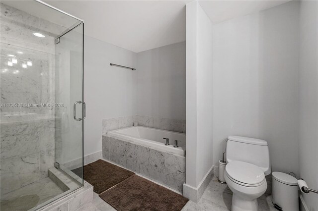253 NE 2nd St Unit 2201, Miami, FL 33132 - bathroom featuring toilet, a marble finish shower, a bath, and baseboards