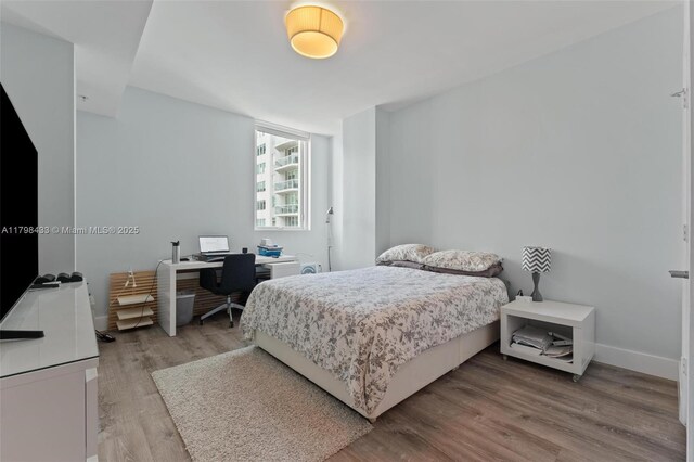 253 NE 2nd St Unit 2201, Miami, FL 33132 - full bathroom featuring a stall shower, a bath, vanity, and toilet