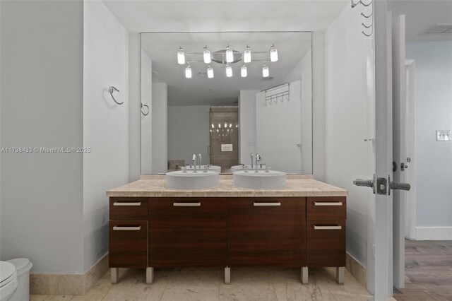 253 NE 2nd St Unit 2201, Miami, FL 33132 - full bathroom featuring a stall shower, a bath, vanity, and toilet