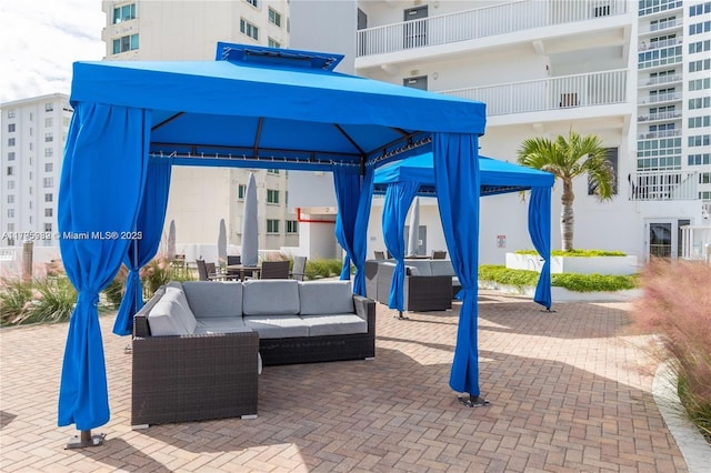 view of patio / terrace with a gazebo and an outdoor living space