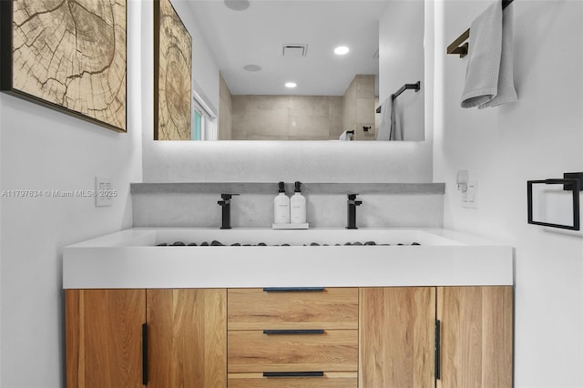 270 NE 104th St, Miami Shores, FL 33138 - full bath featuring a tile shower, double vanity, and recessed lighting