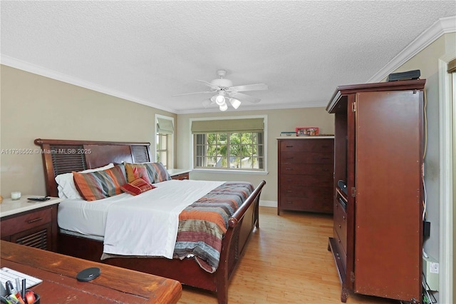 15007 SW 141st Pl, Miami, FL 33186 - bedroom featuring light wood-style floors, crown molding, a textured ceiling, and a ceiling fan