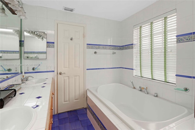 15007 SW 141st Pl, Miami, FL 33186 - full bath with tiled tub, double vanity, and tile walls