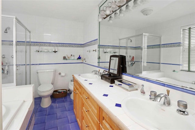 15007 SW 141st Pl, Miami, FL 33186 - full bathroom with a shower stall, tile walls, toilet, a bath, and double vanity